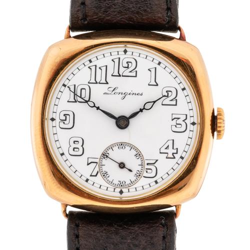 AN 18CT GOLD LONGINES WATCH
