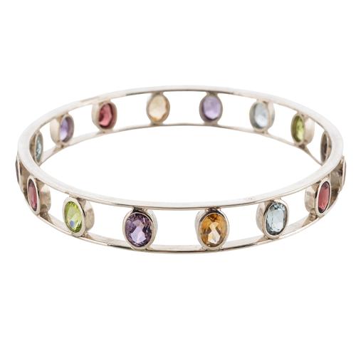 A MULTI GEM SET FIXED BANGLE