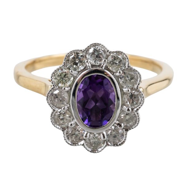 AN AMETHYST AND DIAMOND CLUSTER RING (2)
