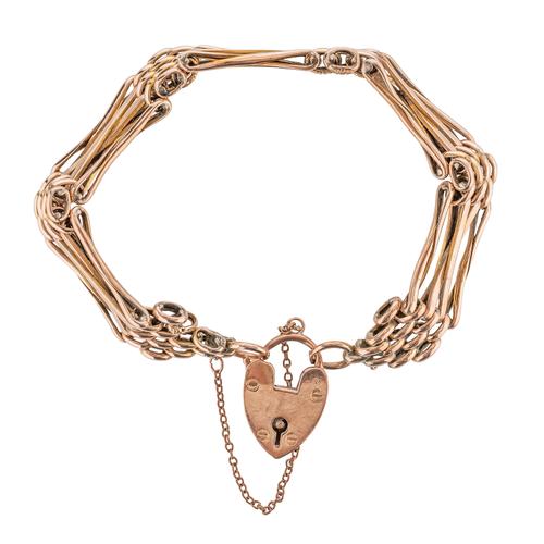 A 9CT GOLD GATE BRACELET