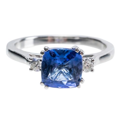 A TANZANITE AND DIAMOND RING