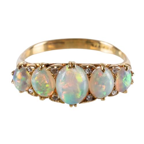 A FIVE STONE OPAL RING