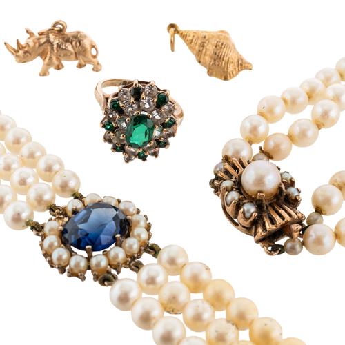 TWO GOLD CHARMS, TWO NECKLACES AND A COSTUME GREEN STONE RING (5)