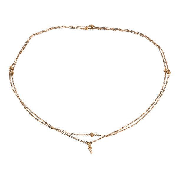 A 9CT GOLD LONG GUARD CHAIN