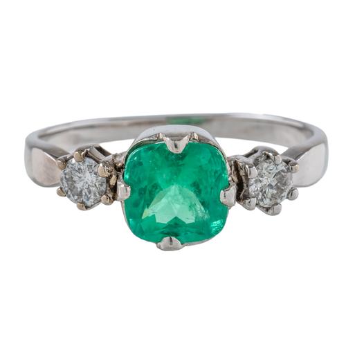 AN EMERALD AND DIAMOND RING