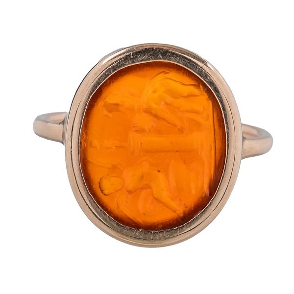 A GOLD MOUNTED CORNELIAN INTAGLIO RING