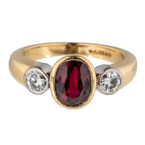 A SYNTHETIC RUBY AND DIAMOND TRILOGY RING