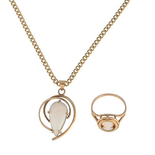 AN OPAL PENDANT WITH A NECKCHAIN AND A 9CT GOLD AND CAMEO RING (2)