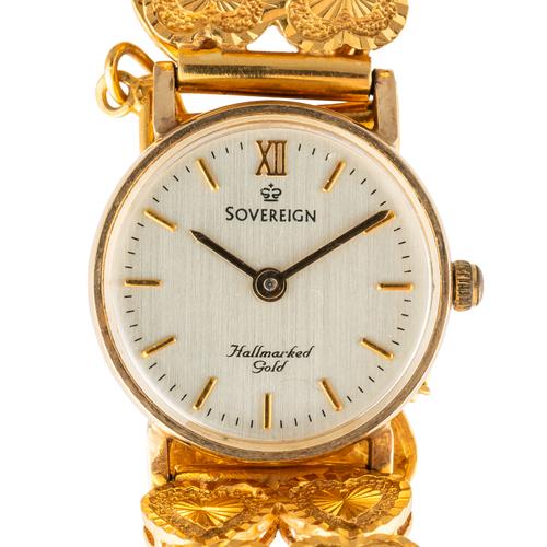 A SOVEREIGN 9CT GOLD CIRCULAR CASED LADY'S WRISTWATCH