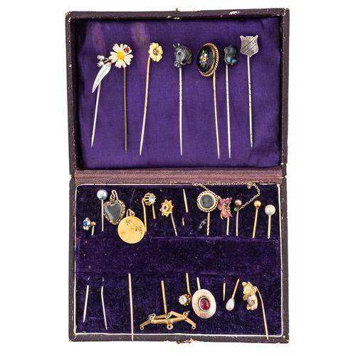 A COLLECTION OF TWENTY-THREE STICK PINS (23)