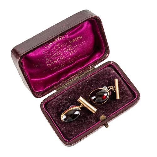 A PAIR OF GARNET SET CUFFLINKS