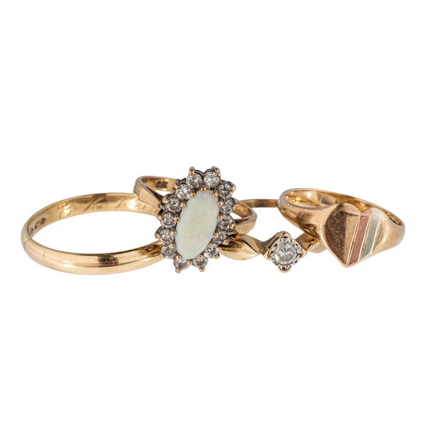 FOUR GOLD RINGS (4)