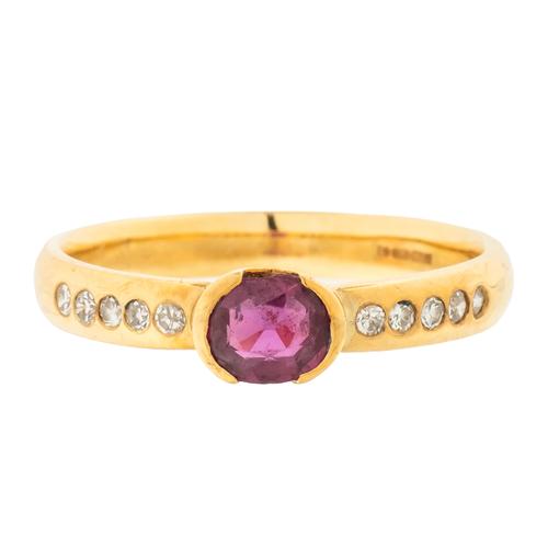 AN 18CT GOLD RUBY AND DIAMOND RING