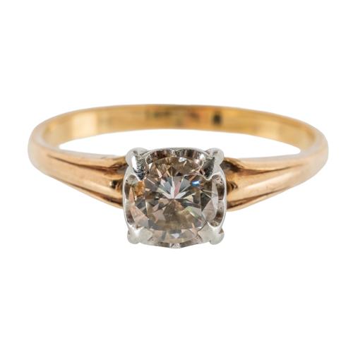 A GOLD AND DIAMOND SINGLE STONE RING