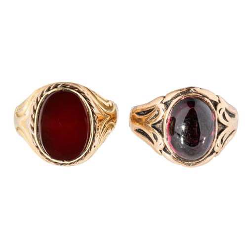 TWO GOLD AND RED GEM SET RINGS (2)