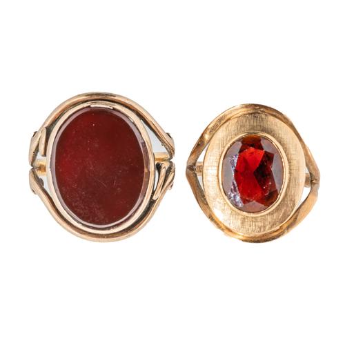 TWO GOLD AND RED GEM RINGS