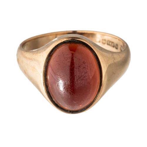A 9CT GOLD GARNET SET RING