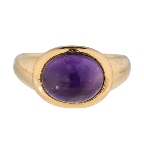 AN 18CT GOLD AMETHYST RING
