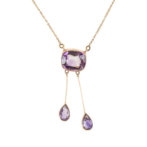 A GOLD AND AMETHYST THREE STONE NECKLACE