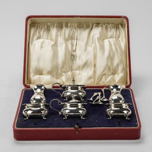 A SILVER SIX PIECE CRUET SET