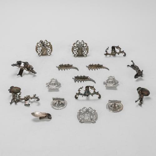 TWO PAIRS OF SILVER STANDS AND TEN FURTHER STANDS (17)