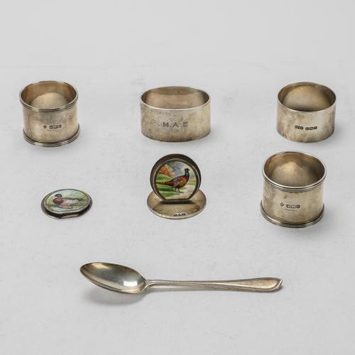 FOUR SILVER NAPKIN RINGS AND THREE FURTHER ITEMS (7)