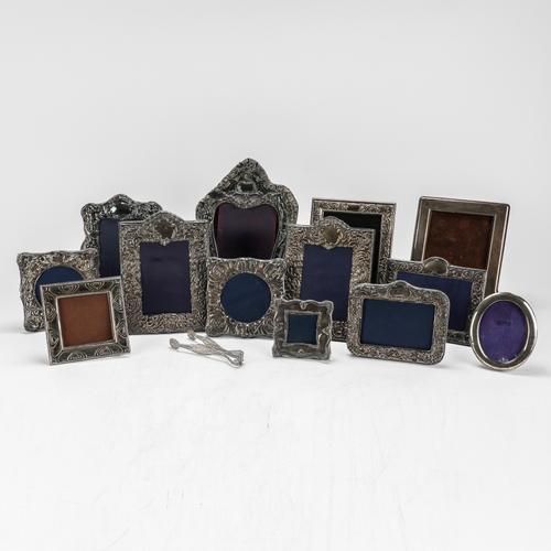 A GROUP OF TWELVE MODERN SILVER MOUNTED PHOTOGRAPH FRAMES AND TWO FURTHER ITEMS (14)