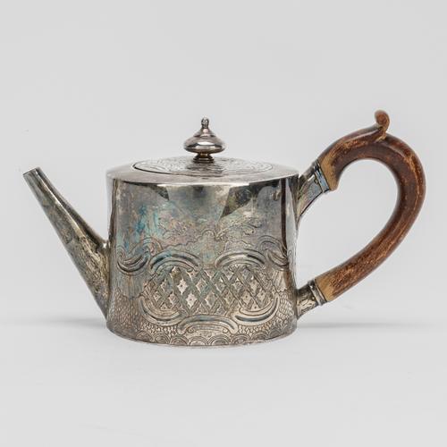 AN EARLY GEORGE III  SILVER TEAPOT