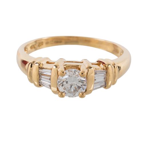 An 18CT GOLD AND DIAMOND RING