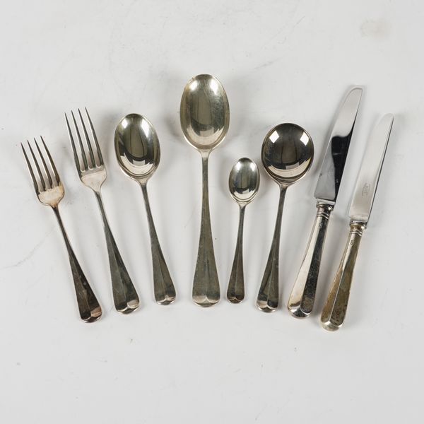 A SILVER 'RAT TAIL' PATTERN CANTEEN OF TABLE FLATWARE