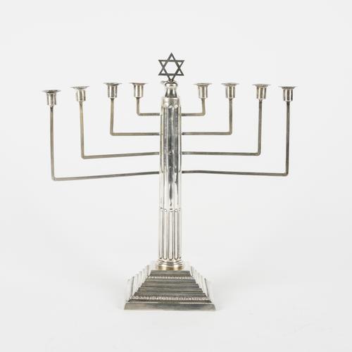 A SILVER NINE LIGHT TABLE MENORAH