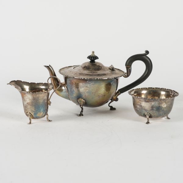 A SILVER THREE PIECE TEA SET (3)
