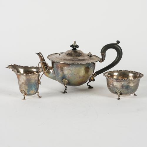 A SILVER THREE PIECE TEA SET (3)