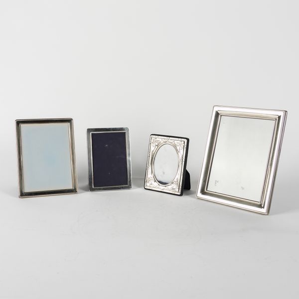 FOUR SILVER MOUNTED MODERN RECTANGULAR PHOTOGRAPH FRAMES (4)