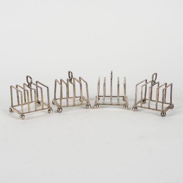 FOUR SILVER FIVE BAR TOASTRACKS (4)
