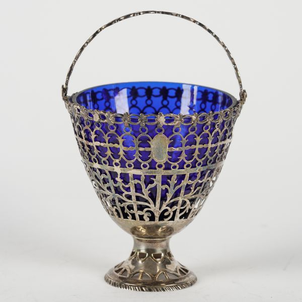 A GEORGE III SILVER SUGAR BASKET
