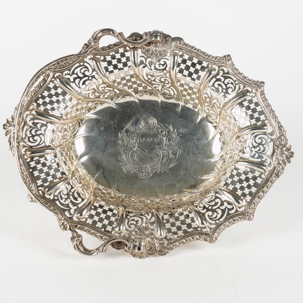 A LATE GEORGE II SILVER SHAPED OVAL CAKE OR FRUIT BASKET