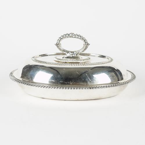 A SILVER OVAL ENTREE DISH AND COVER