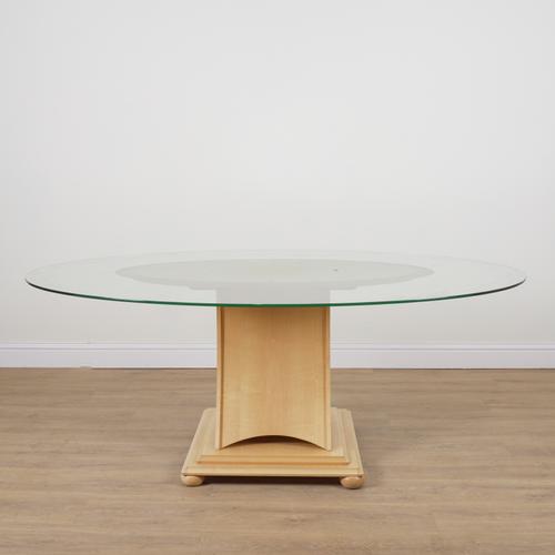 A 20TH CENTURY OVAL GLASS DINING TABLE