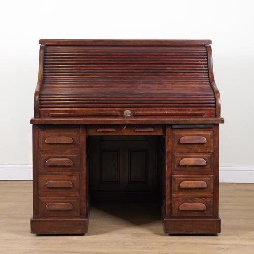 A 19TH CENTURY MAHOGANY ROLL TOP DESK