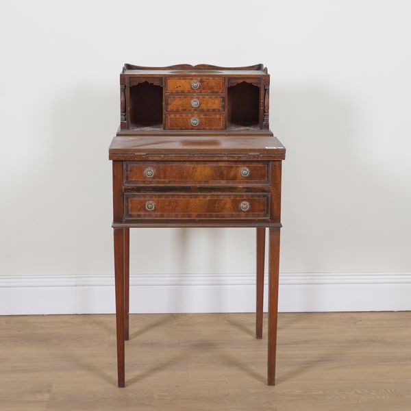 AN EDWARDIAN MAHOGANY WRITING TABLE