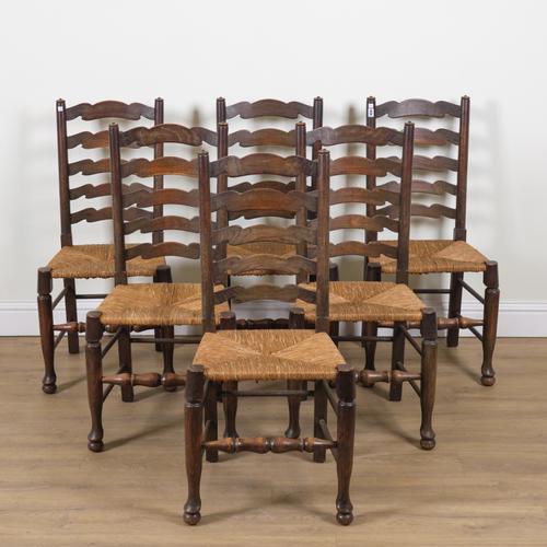 A SET OF SIX ASH AND ELM LADDER BACK DINING CHAIRS (6)