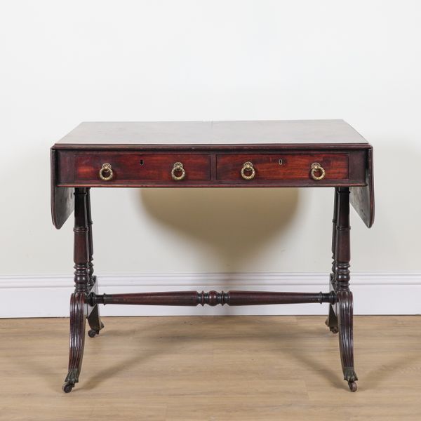 A REGENCY MAHOGANY DROP FLAP SOFA TABLE