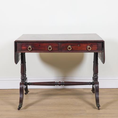 A REGENCY MAHOGANY DROP FLAP SOFA TABLE