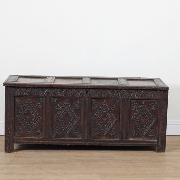 A MID 17TH CENTURY OAK CARVED COFFER