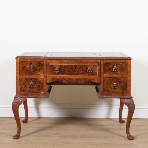 A QUEEN ANNE STYLE MAHOGANY AND WALNUT WRITING DESK