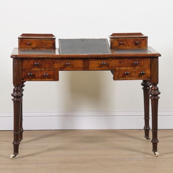 A VICTORIAN WALNUT WRITING DESK