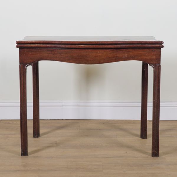 A GEORGE III MAHOGANY SERPENTINE FOLD OVER TEA TABLE