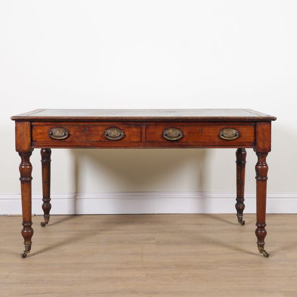 A VICTORIAN MAHOGANY TWO DRAWER WRITING DESK