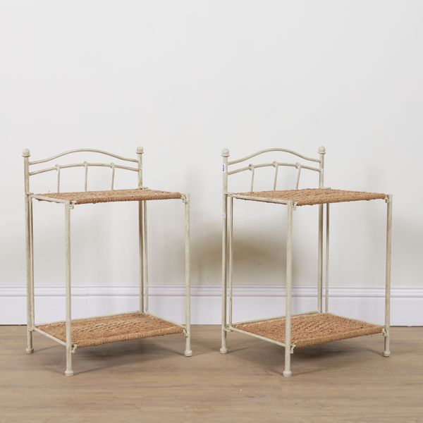 A PAIR OF MODERN WHITE PAINTED RATTAN FOLDING TWO TIER BEDSIDE TABLES (2)